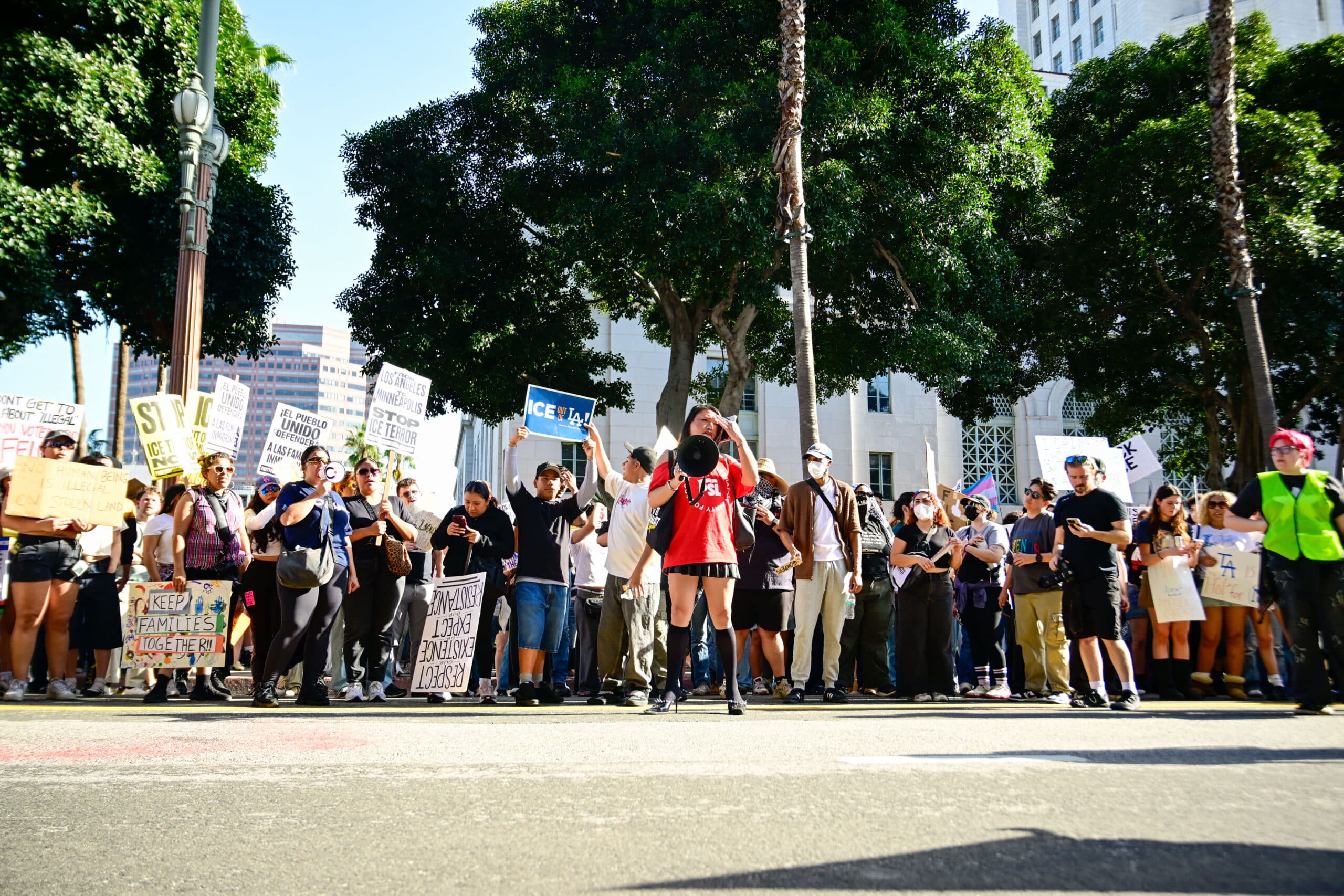 Los Angeles, California, USA, Jan. 30, 2026: A woman shouts on a megaphone while thousands gather in front of the Los Angeles City Hall in response to recent ICE raids and arrests in the United States. (Credit: Weston Hancock / Alamy Live News)